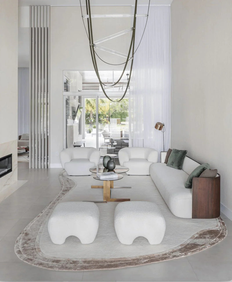 Modern handwoven rug in neutral tones by Kaymanta Miami – luxury handmade design.