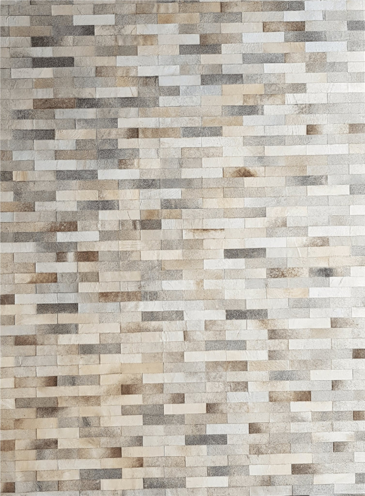Brickell handmade cowhide rug – luxury leather, hand-stitched rectangular pieces for modern interiors