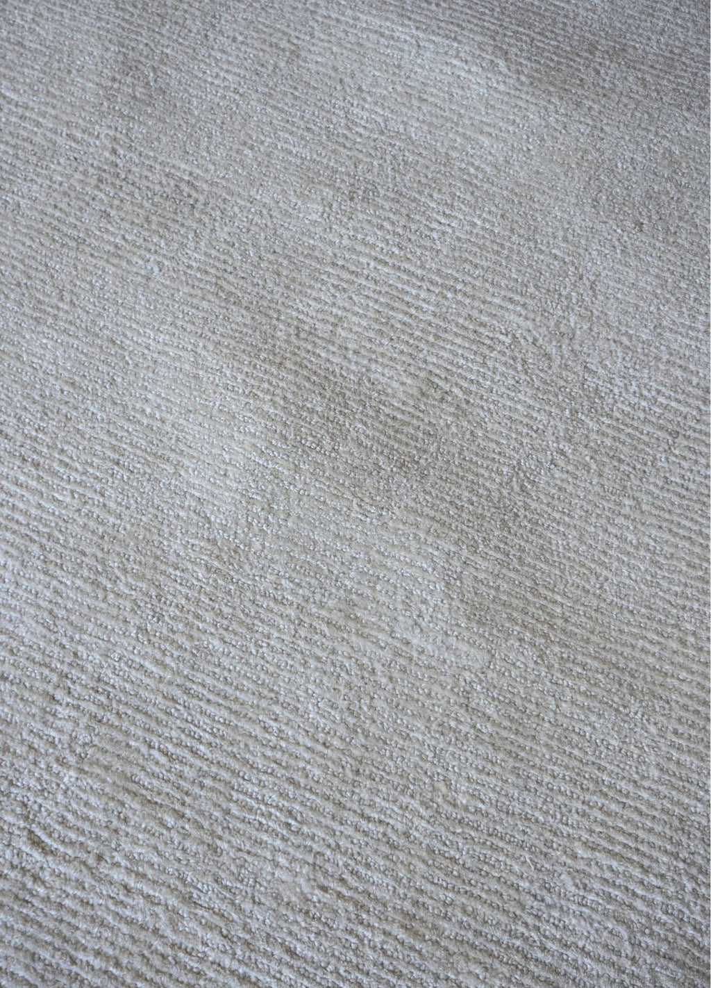 Close-up of a textured gray fabric surface