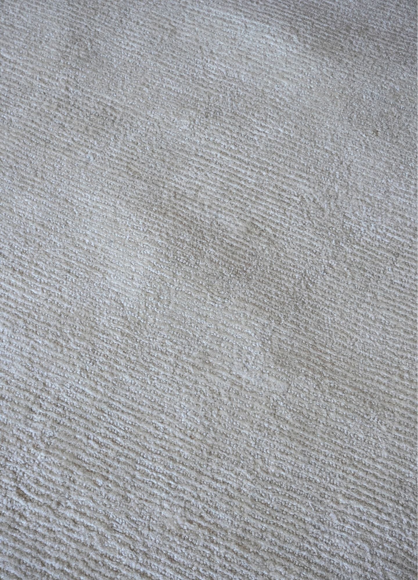 Close-up of a textured gray fabric surface
