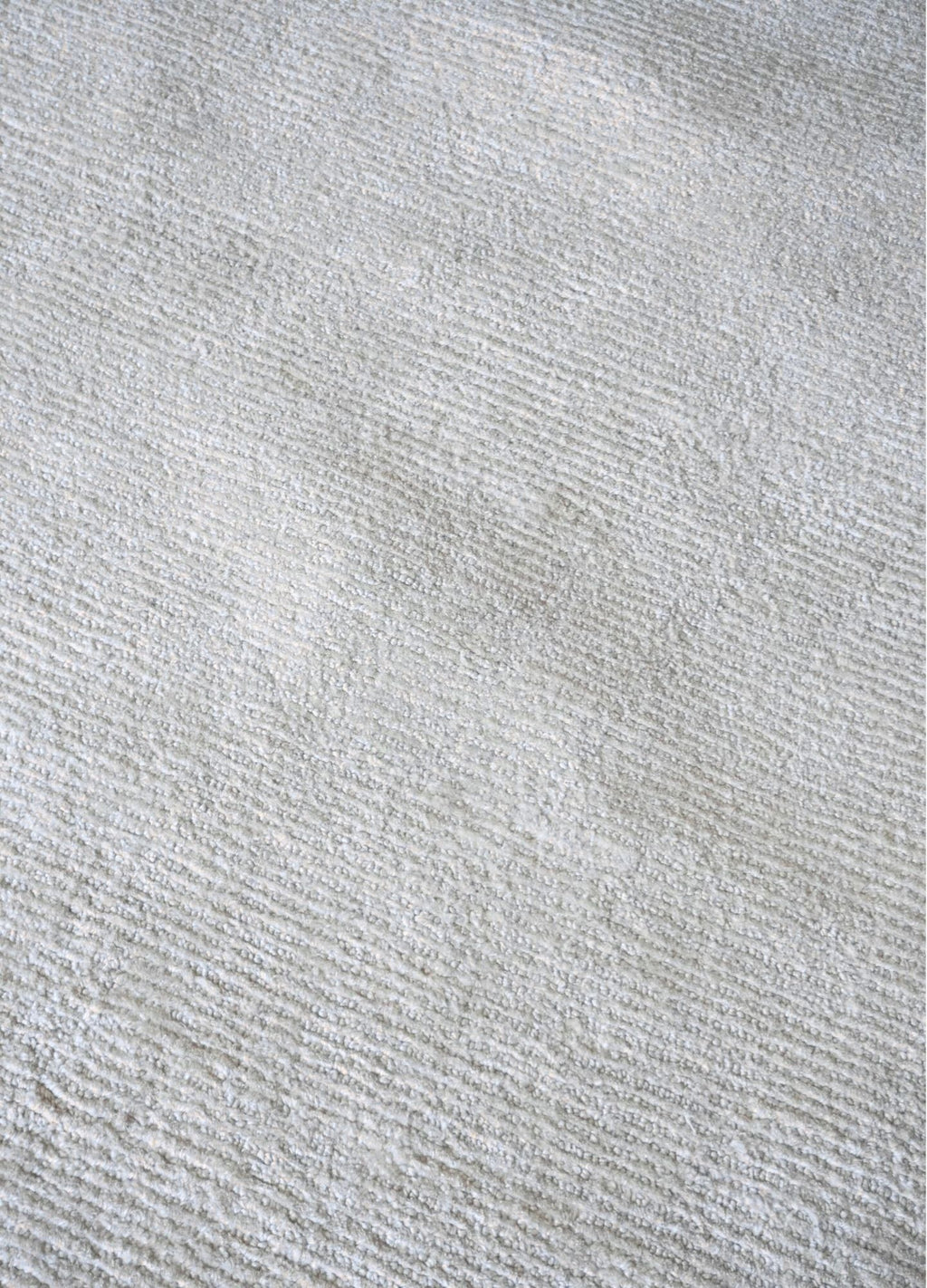 Close-up of a textured gray fabric surface