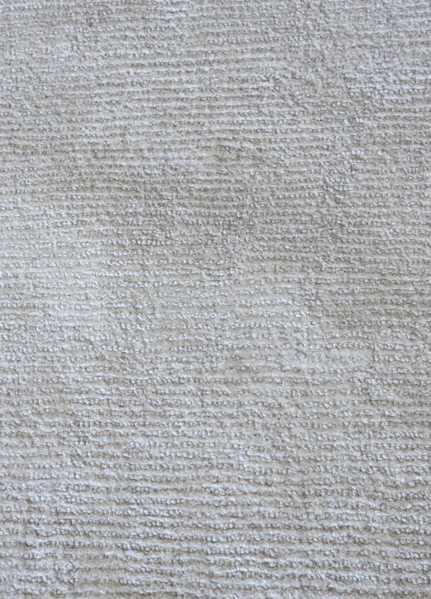 Close-up of a textured gray fabric surface