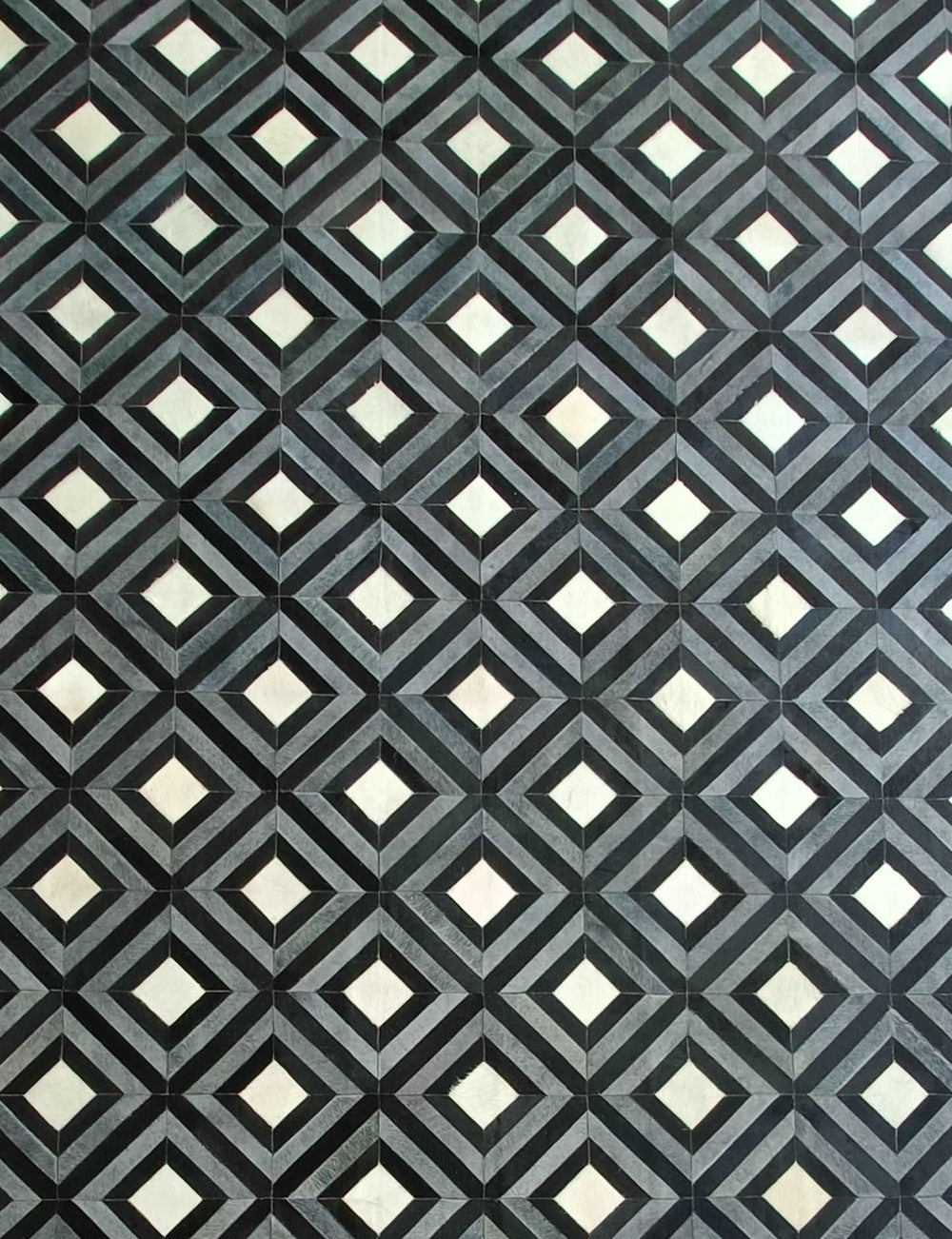 Miami handmade cowhide rug – geometric design, high-quality leather patches, modern aesthetic