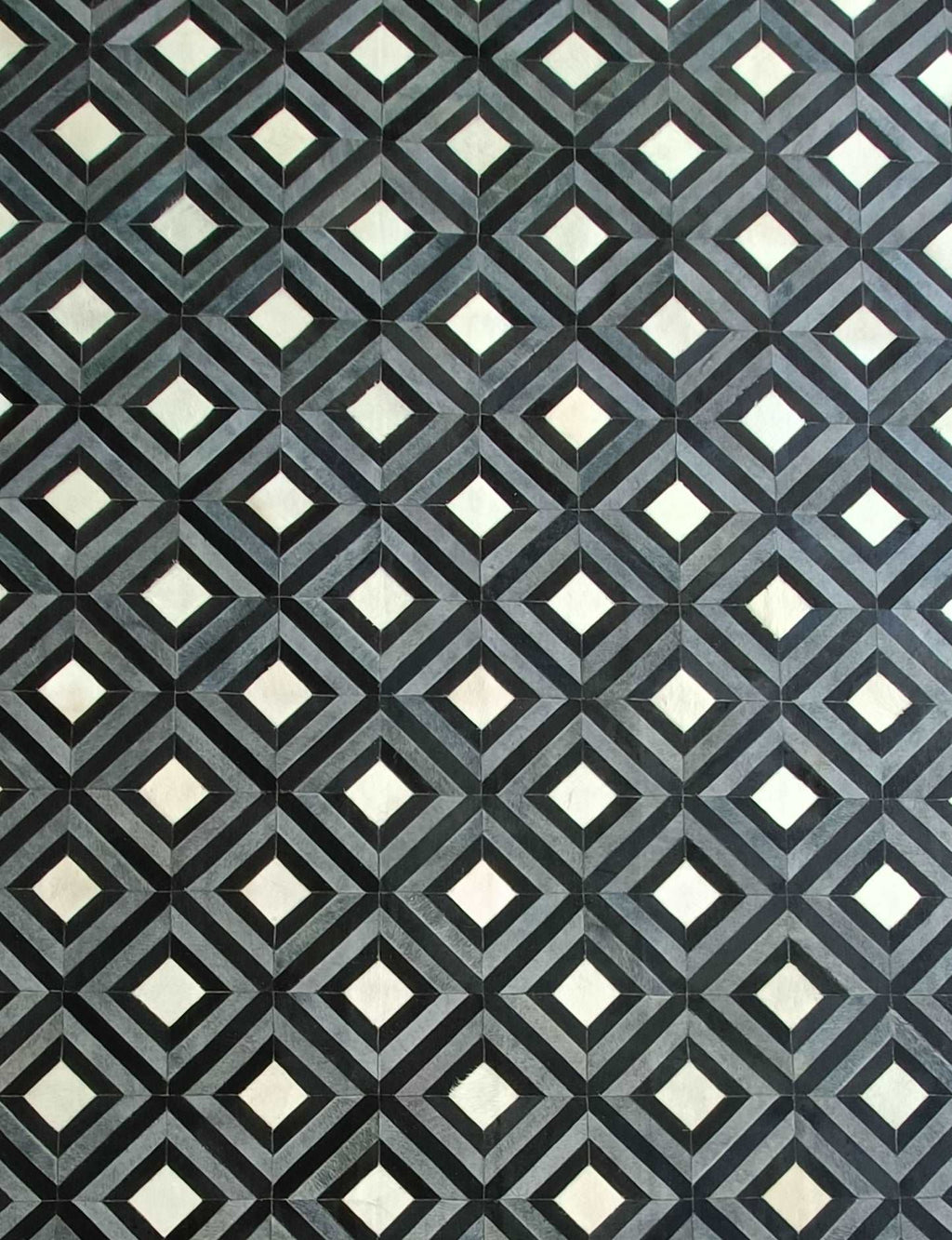 Miami handmade cowhide rug – geometric design, high-quality leather patches, modern aesthetic
