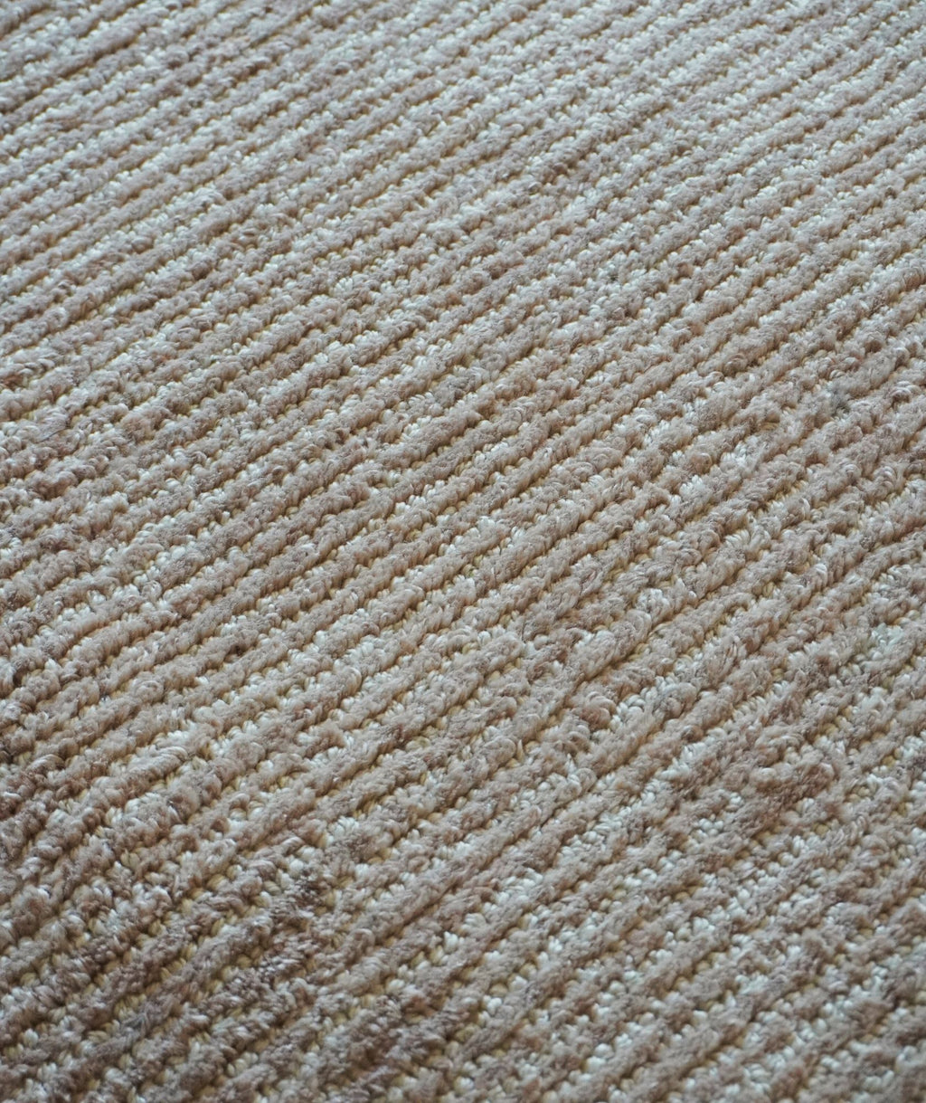 Close-up of beige carpet texture
